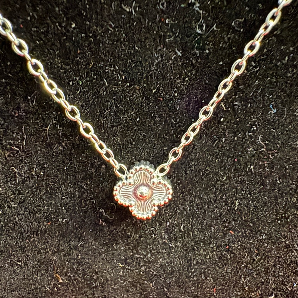 Beautiful, simple, silver tone, single micro clover necklace. 18k plated.